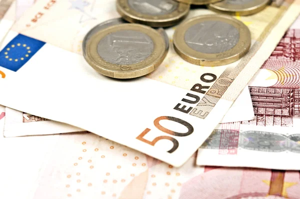 Notas e moedas de euro — Fotografia de Stock