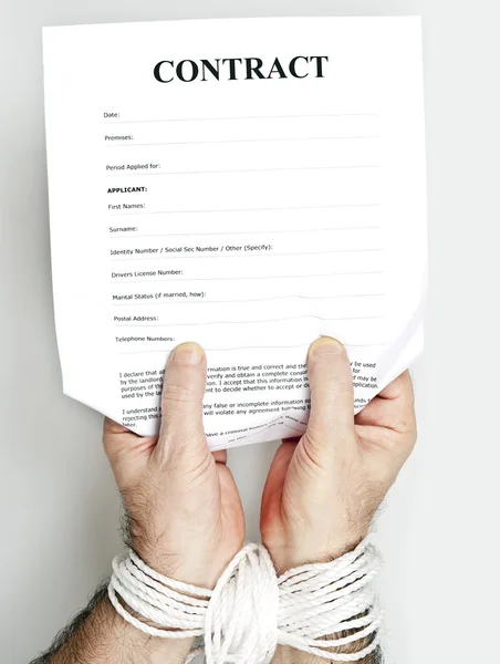 Contract and hands tied — Stock Photo, Image