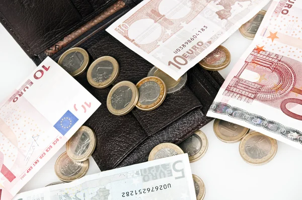 Банкноти та монети євро — стокове фото