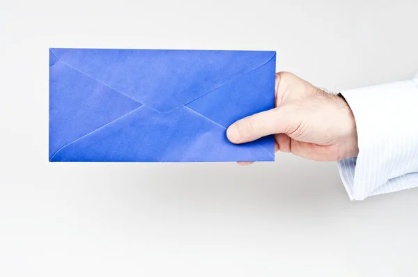 Envelope in male hand — Stock Photo, Image
