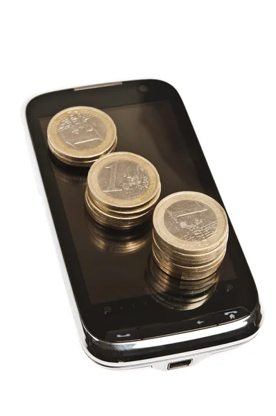 stock image Coins on phone