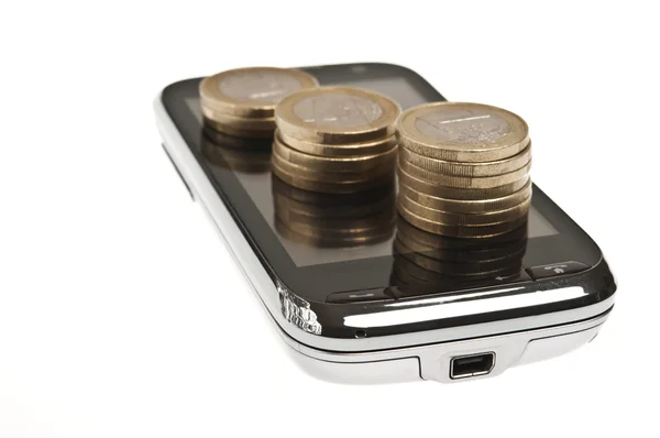 stock image Coins on phone