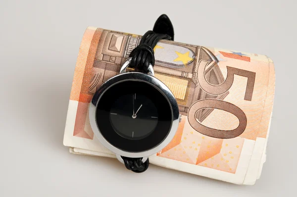 Money and clock — Stock Photo, Image