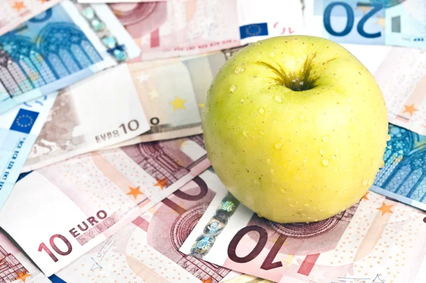 stock image Apple on money