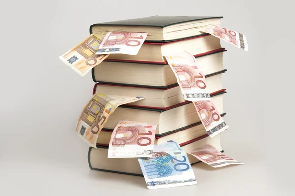 Money in books — Stock Photo, Image
