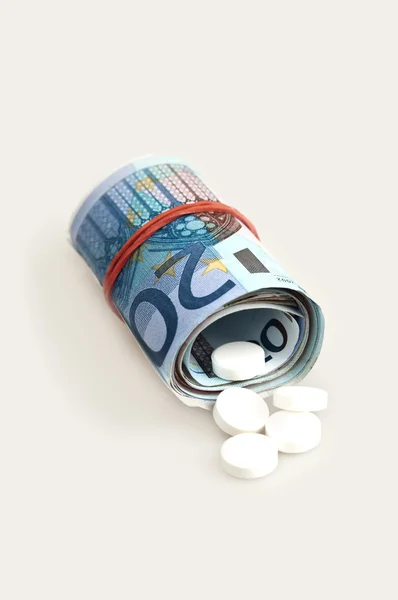 Money and pills — Stock Photo, Image