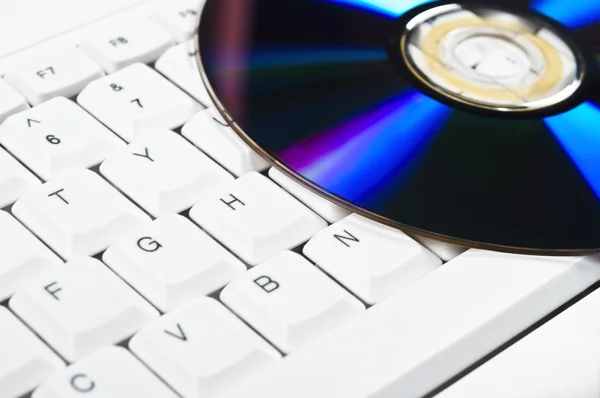 Keyboard and cd-roms — Stock Photo, Image