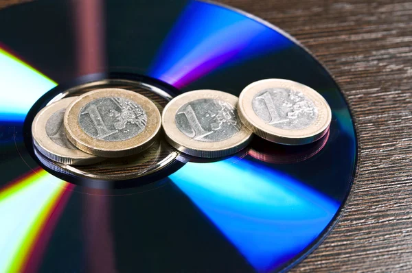 Cd and euro coins — Stock Photo, Image