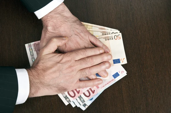 Hands on money — Stock Photo, Image