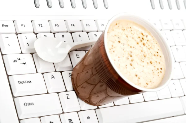 stock image Coffee on keyboard