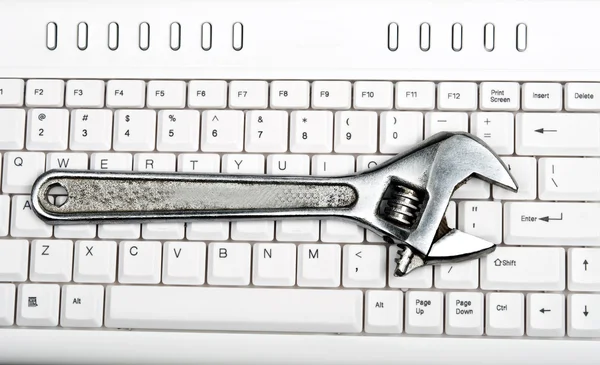 stock image Hand tool on keyboard