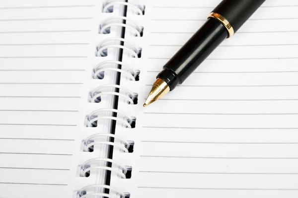 Notebbok ve kalem — Stok fotoğraf