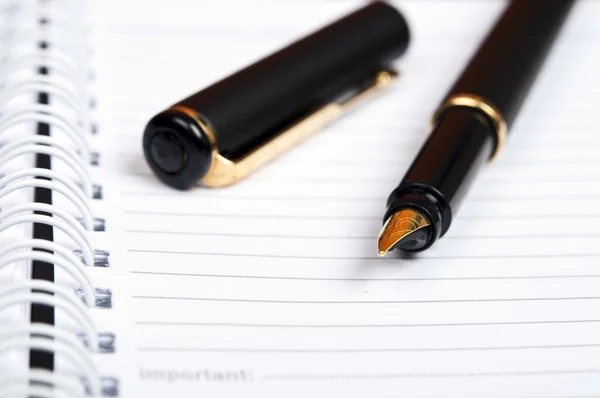 Notebbok e caneta — Fotografia de Stock