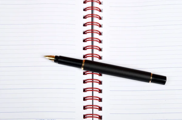 Notebbok ve kalem — Stok fotoğraf