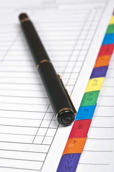 Notebbok и ручка — стоковое фото