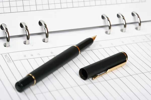 Notebbok и ручка — стоковое фото