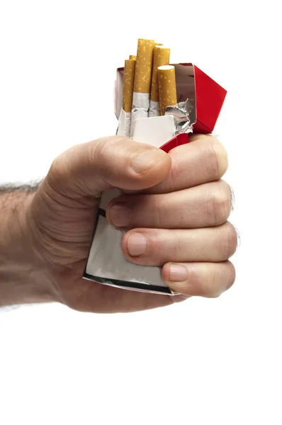 Сигарети в кулак — стокове фото