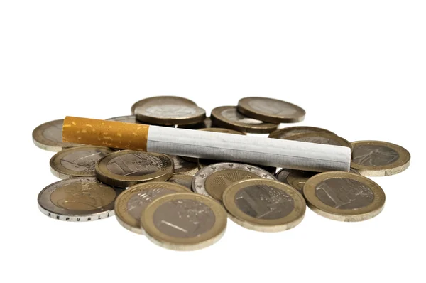 Cigarro em dinheiro — Fotografia de Stock