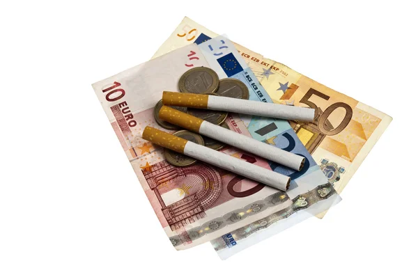 Сигарети на гроші — стокове фото