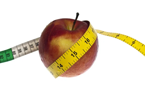 Fita de medição e maçã — Fotografia de Stock