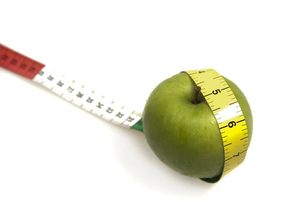 Ruban de mesure et pomme — Photo