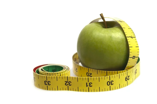 Measurement tape and apple — Stock Photo, Image