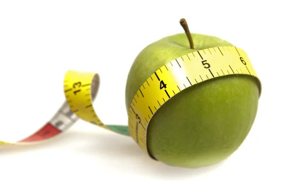 Měření pásky a apple — Stock fotografie