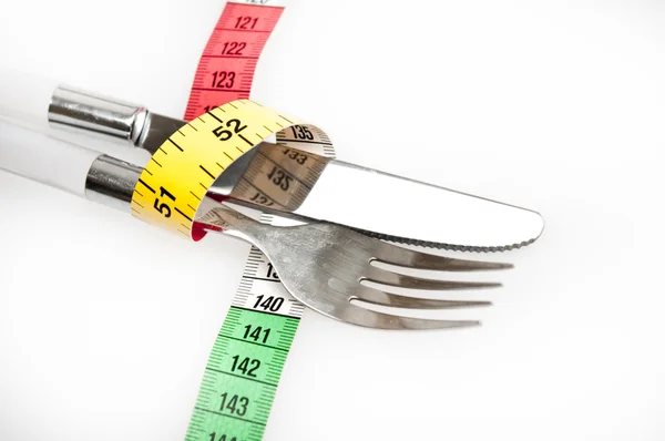 Fita de medição e garfo — Fotografia de Stock