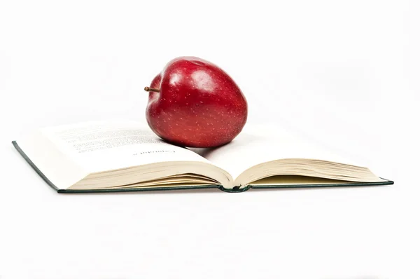 Kniha a apple Stock Fotografie