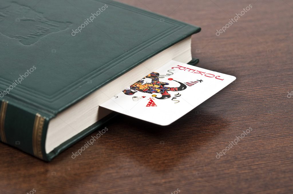 Book And Joker Card Stock Photo C Fuzzbones 6235380
