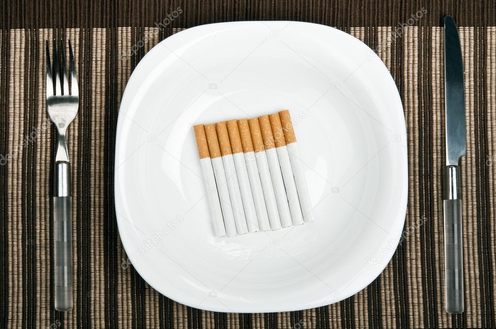 Cigarettes on food plate