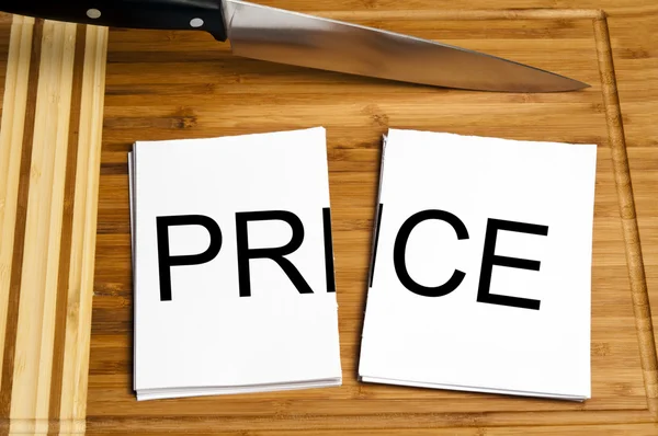 Knife cut paper with price — Stock Photo, Image
