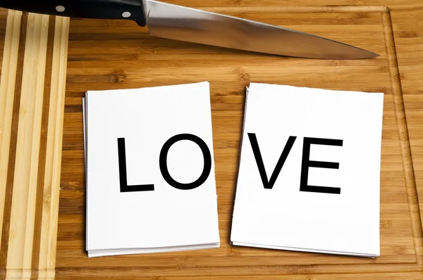 Knife cut paper with love — Stock Photo, Image