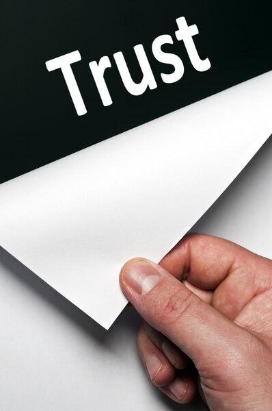 Trust word discovered by male hand