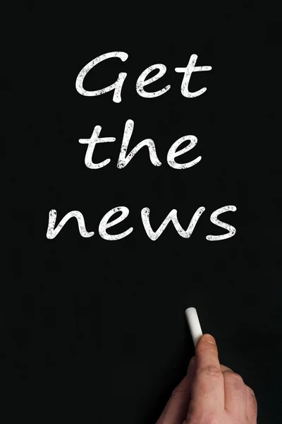 Get the news on black board — Stock Photo, Image