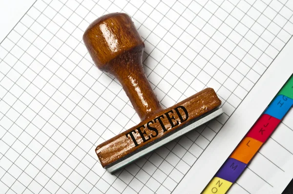Tested stamp — Stock Photo, Image
