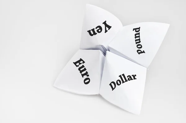 Currencies on fortune teller — Stock Photo, Image
