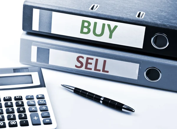 Köp och försäljning skriva på mappen — Stockfoto