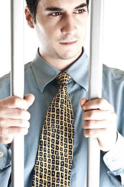 Бизнесмен в тюрьме — стоковое фото