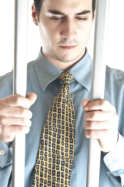 Бизнесмен в тюрьме — стоковое фото