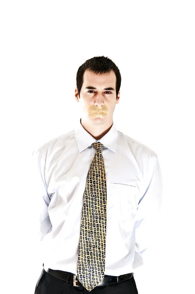 Obchodní muž s lepicí páskou na ústa — Stock fotografie