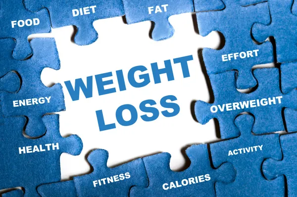 Weight loss puzzle Royalty Free Stock Images