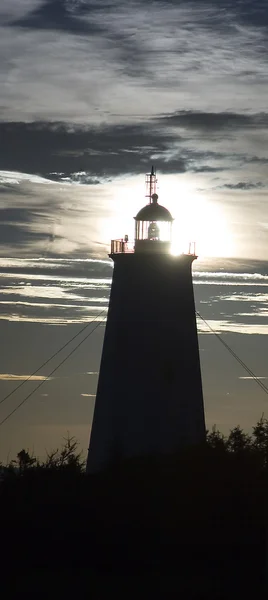 Napfelkelte a világítótorony — Stock Fotó