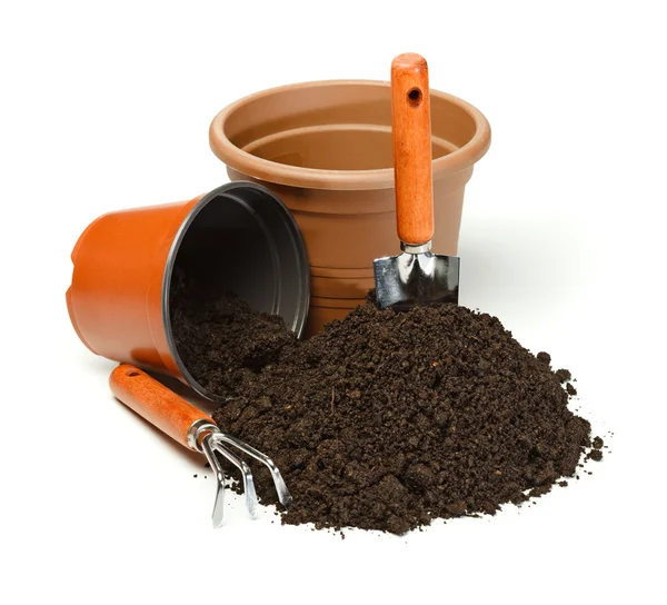 Pots, outils de jardinage et saletés — Photo