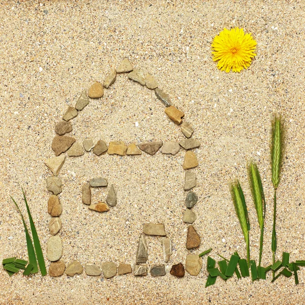 Stone house illustration in sand — Stock Photo, Image