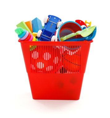 Lots of plastic toys thrown in garbage bin clipart