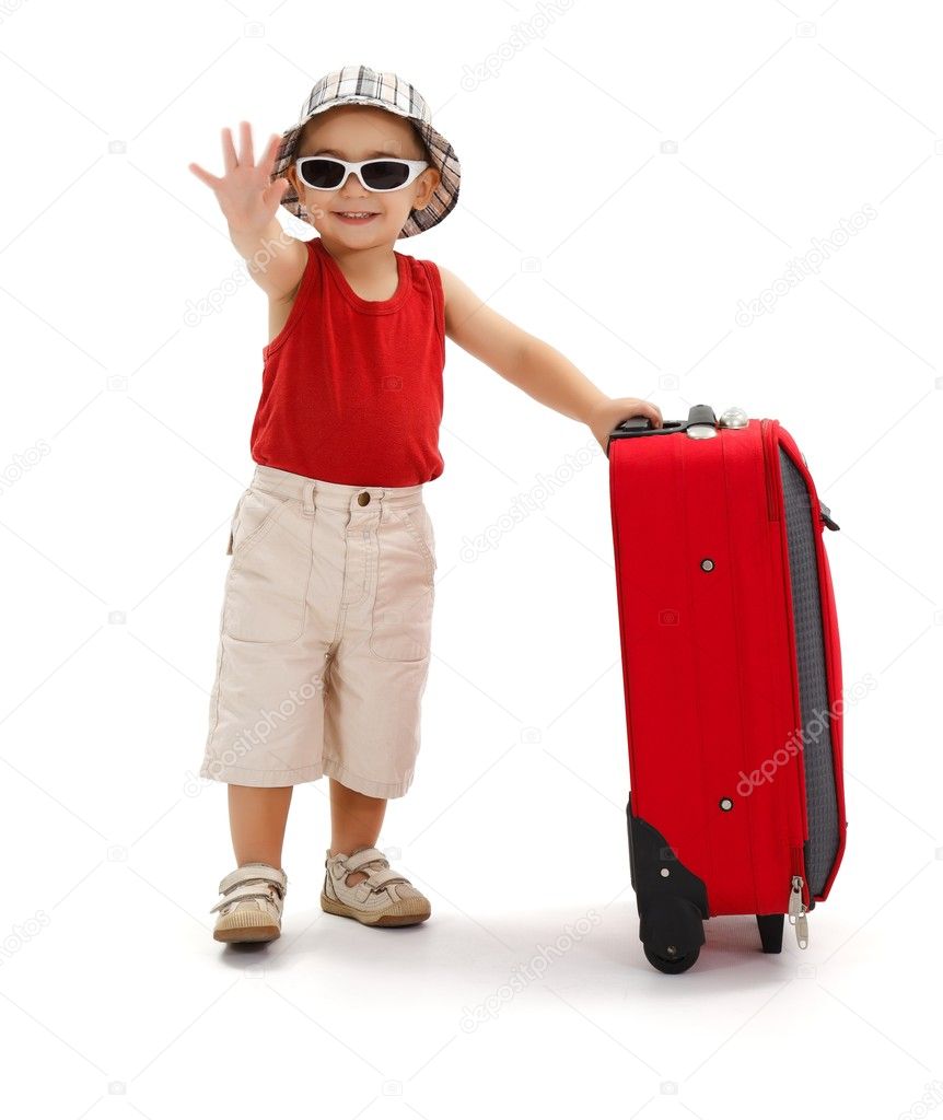 Child in sunglasses, waving with hand