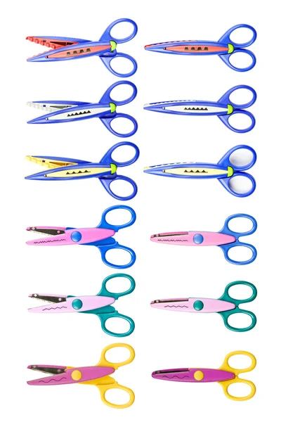 Цветные зигзагообразные ножницы — стоковое фото
