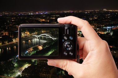 Taking picture of night Paris clipart