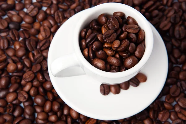 stock image Cup full of coffee beans